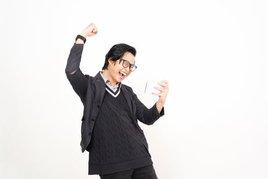 A man in glasses and a sweater is holding up his fist photo