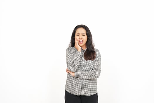 A woman is holding her mouth and looking at the camera photo