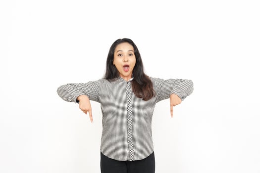 A woman is standing with her arms outstretched photo