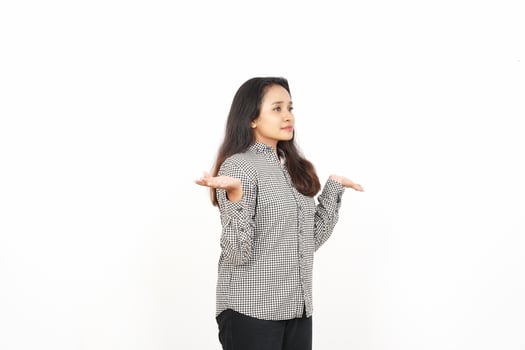 A woman standing with her hands outstretched photo