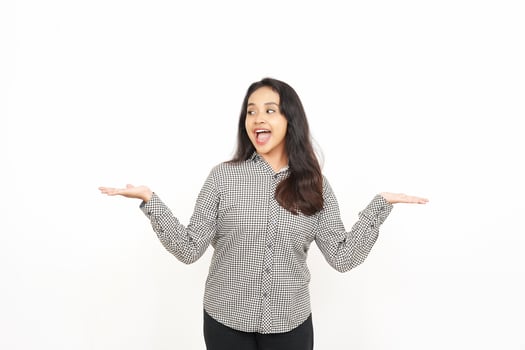 A woman is standing with her hands open and her mouth open photo