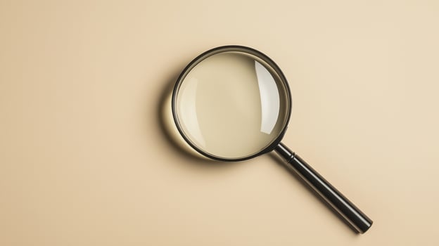 magnifying glass on beige background, perfect for detailed examination photo