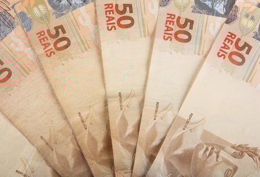 Brazilian money. A close-up of several 50 Brazilian Real banknotes. photo