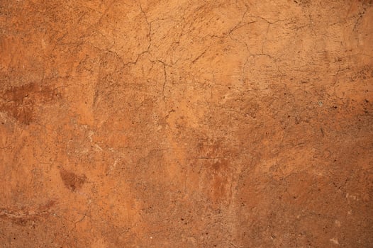 Full frame shot of an earthen wall texture of clay house structure. photo
