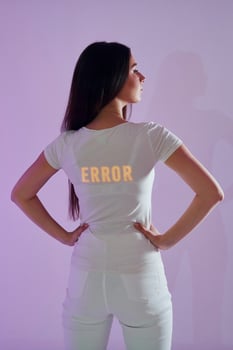 A woman wearing a t - shirt with the word error on it photo