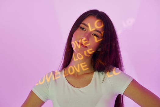 A woman with long hair and a white shirt photo