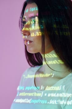 A woman with a computer code on her face photo