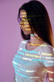 A woman wearing glasses and a white shirt with a rainbow background photo
