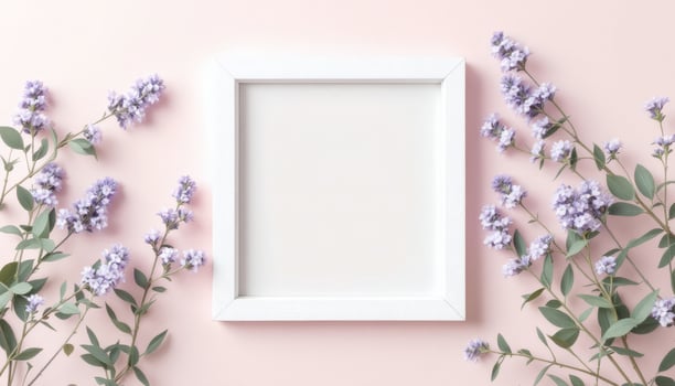 Elegant White Frame with Lavender Sprigs on a Soft Pink Background photo