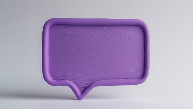 A purple speech bubble on a white background photo