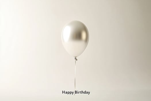 Minimalist Happy Birthday Card with Silver Balloon on White Background for Modern Design photo