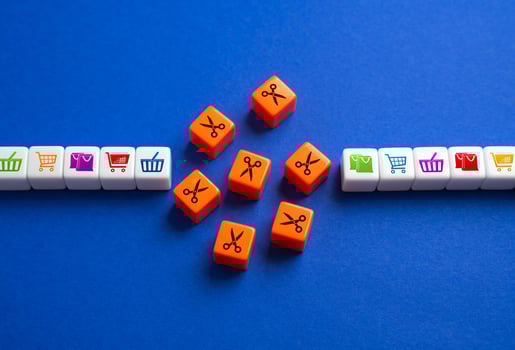 Reduce spending on purchases and shopping. Budgeting, cost-saving strategies, and reduced discretionary spending impact retail, commerce, and economic growth. photo