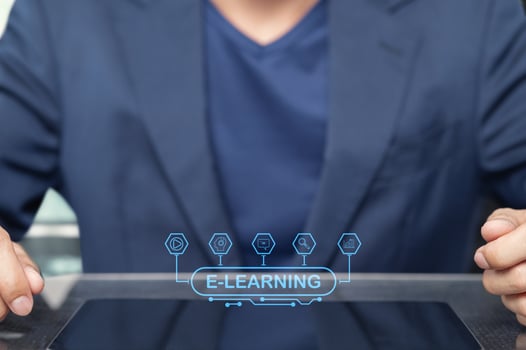 Modern E Learning Concept with a Businessman Using a Tablet Device photo