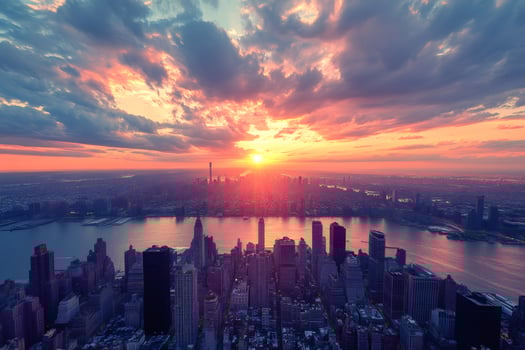 Breathtaking sunset over Manhattan, New York City, creates colorful cityscape panorama photo