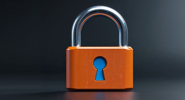 An orange padlock with a blue keyhole photo