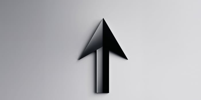 Black arrow pointing upward a symbol of growth progress and success. photo