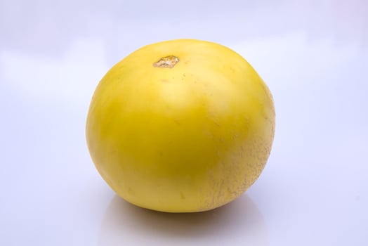 Fresh Yellow Honeydew Melon, Close-Up Shot Isolated on White Background photo
