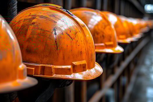Construction Safety Close-Up of Worn Hard Hats Reflecting Industrial Resilience photo