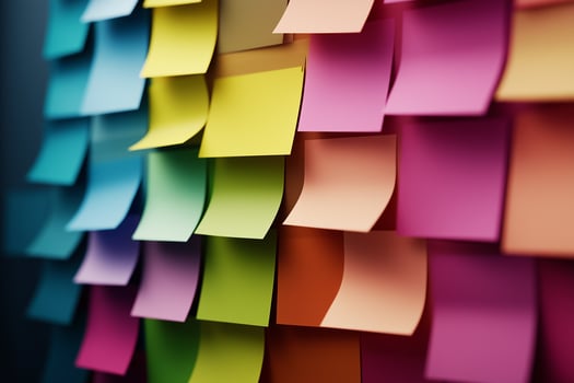 a wall covered in colorful post it notes photo