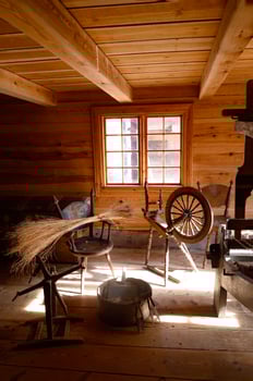 Old spinning wheel loom machine in interior in the Museum Kulturen Lund Sweden. photo