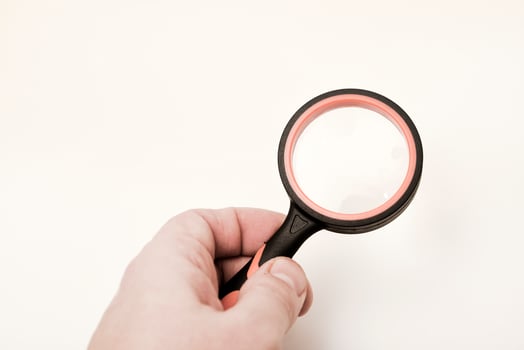 A magnification device for the visually impaired.Magnifying glass on a white background. photo