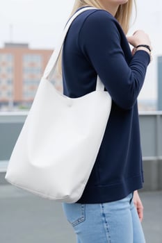 Blank Tote Bag Mockup on Woman Wearing Stylish Apparel photo