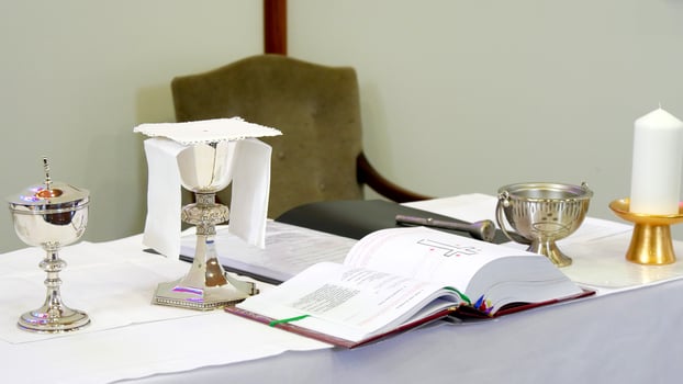 a table with silver and gold items on it photo