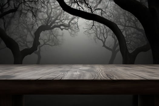 Dark wood table, foggy forest backdrop photo
