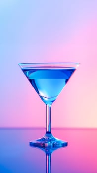 Blue martini cocktail in classic martini glass on reflective surface with neon lighting photo