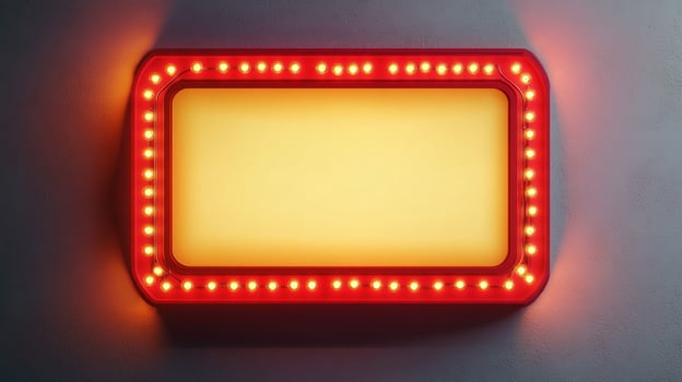 Vintage illuminated sign with a vibrant red border and glowing lights, reminiscent of old theaters and entertainment venues. A retro display photo