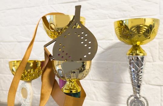 Trophy for champion. Gold winner cup for equestrian sport photo