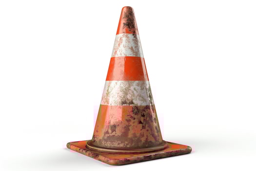 A weathered traffic cone with orange and white stripes, showing signs of wear and tear. photo