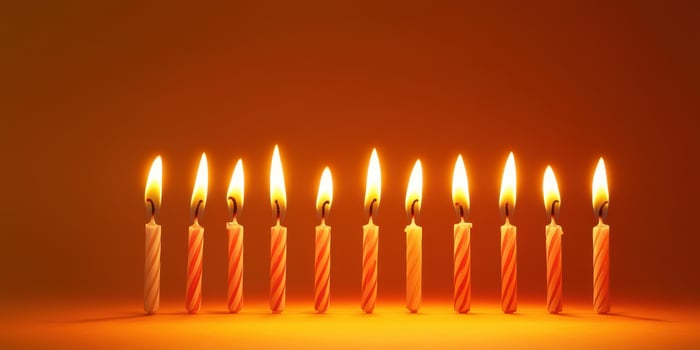 Colorful candles illuminated with vibrant flames creating a warm atmosphere during a celebratory event photo