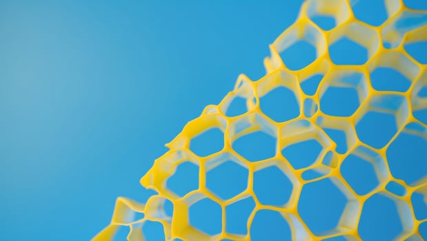 Abstract Yellow Honeycomb Texture on Bright Blue Background. photo