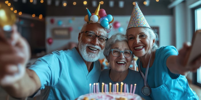Joyful celebration of elderly friends in a decorated room with a birthday cake and colorful party hats photo
