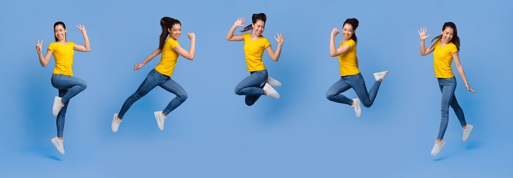 Collage of joyful asian girl jumping in air on purple background, having fun, showing happy emotions, gesturing peace, panorama photo