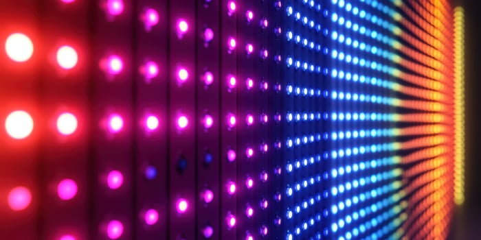 Colorful LED lights create a vibrant display in an indoor setting at night photo