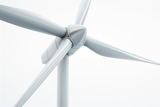 A close-up view of a modern wind turbine showcasing its sleek, aerodynamic blades against a minimalist backdrop. photo