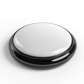 A glossy black and white button on a clean white background, symbolizing a modern design element. photo