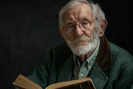 An elderly Caucasian man with glasses, wearing a green jacket, deeply engaged in reading a book with a thoughtful expression. photo