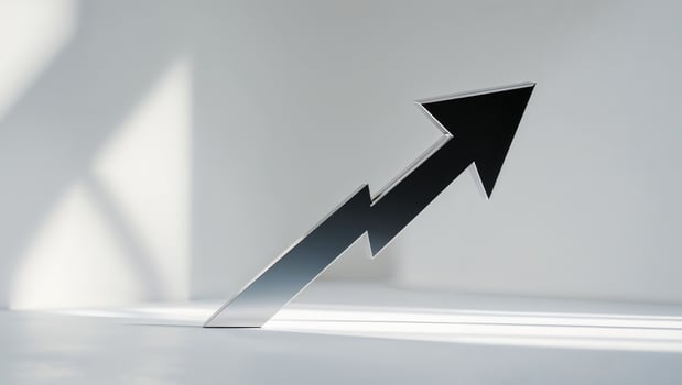 An arrow pointing upward on a white surface photo