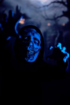 Terrible zombie walking towards camera photo