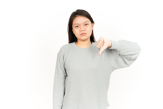 A woman is showing a thumbs down gesture photo