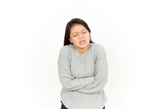 A woman with her hands on her stomach photo