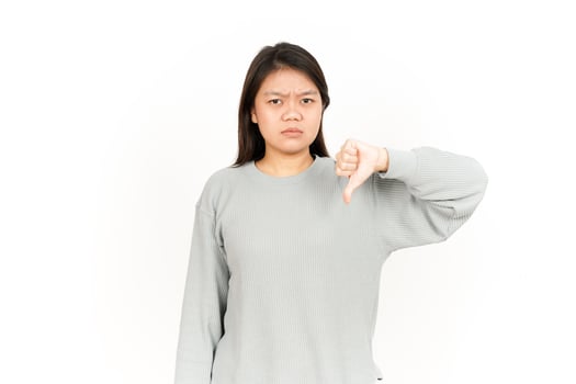 A woman is showing a thumbs down sign photo