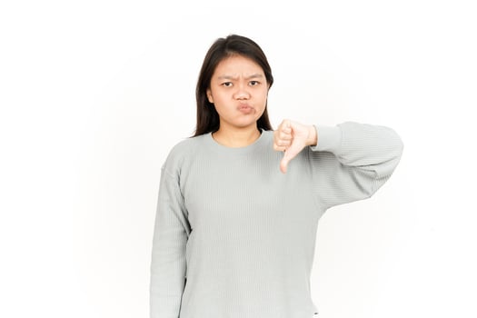 A woman is showing a thumbs down sign photo