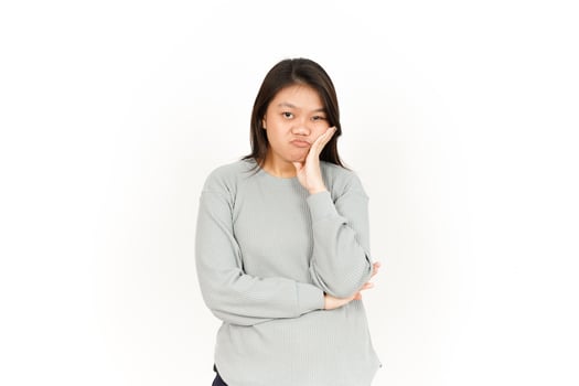 A woman in a gray sweatshirt and jeans photo