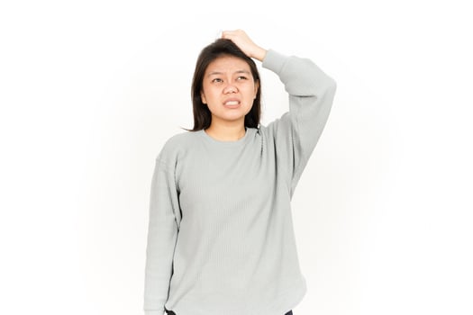A woman in a gray sweatshirt and black pants photo