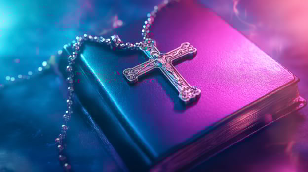 Silver Cross On Purple Book Under Neon Light For Spiritual Symbolism photo
