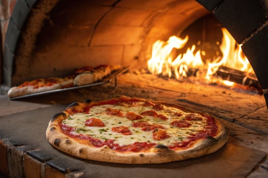 A fresh margherita pizza baking in a traditional wood-fired oven, ready to serve with delicious flavor. photo